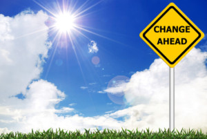CHANGE AHEAD on yellow road warning sign